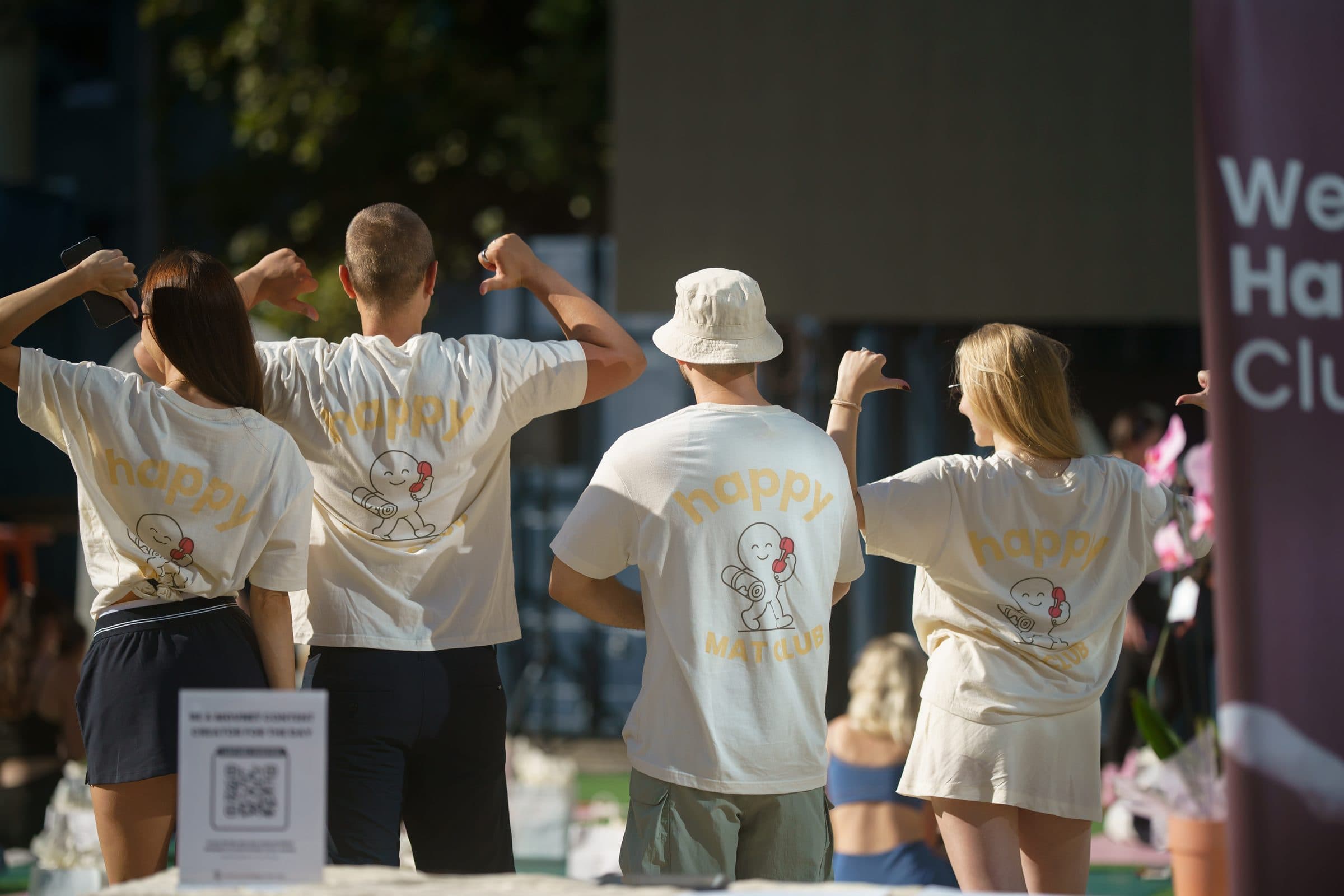 The crew in Happy Mat Club t-shirts